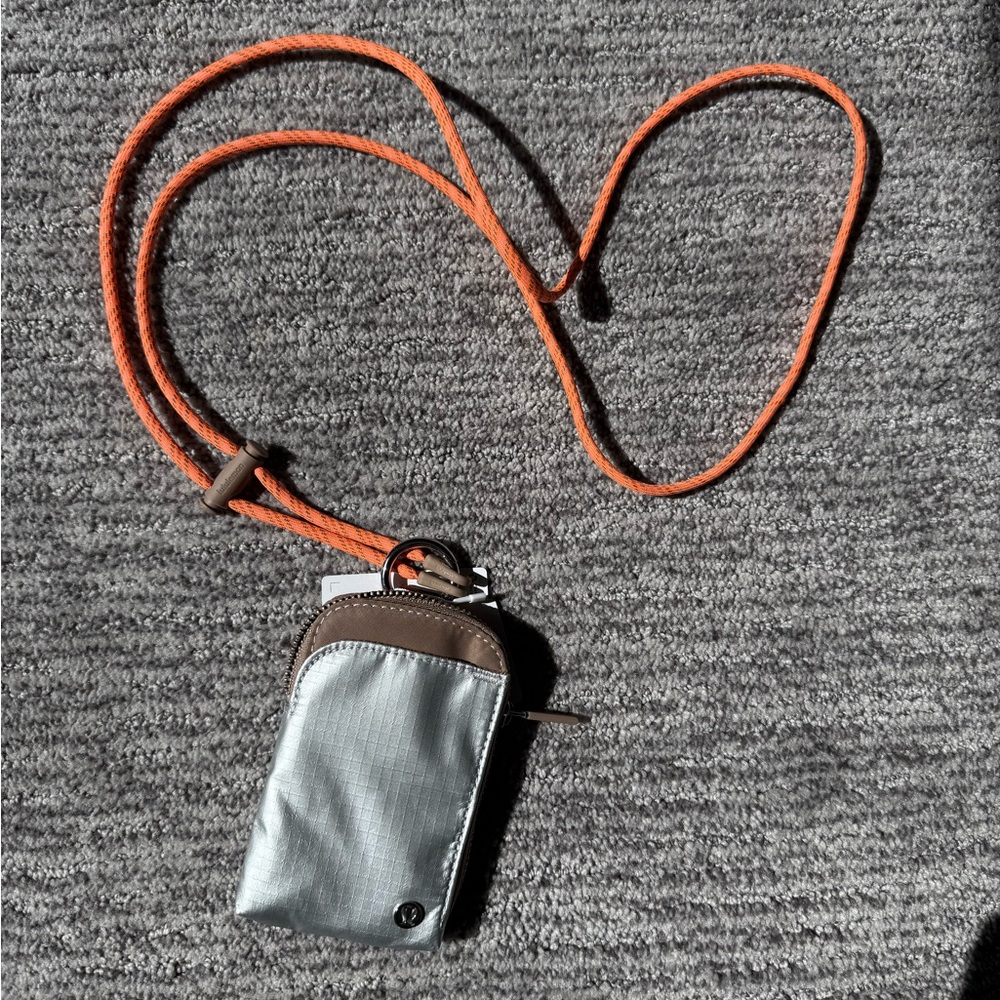 Lululemon Silver and Wearable Card Case with Orange Strap